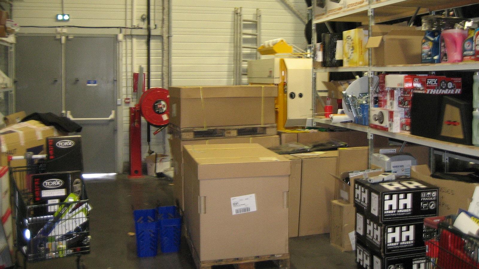 Cardboard boxes with spare parts for cars at Norauto warehouse